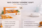 Turmeric soap bars with packaging and benefits listed on a neutral background