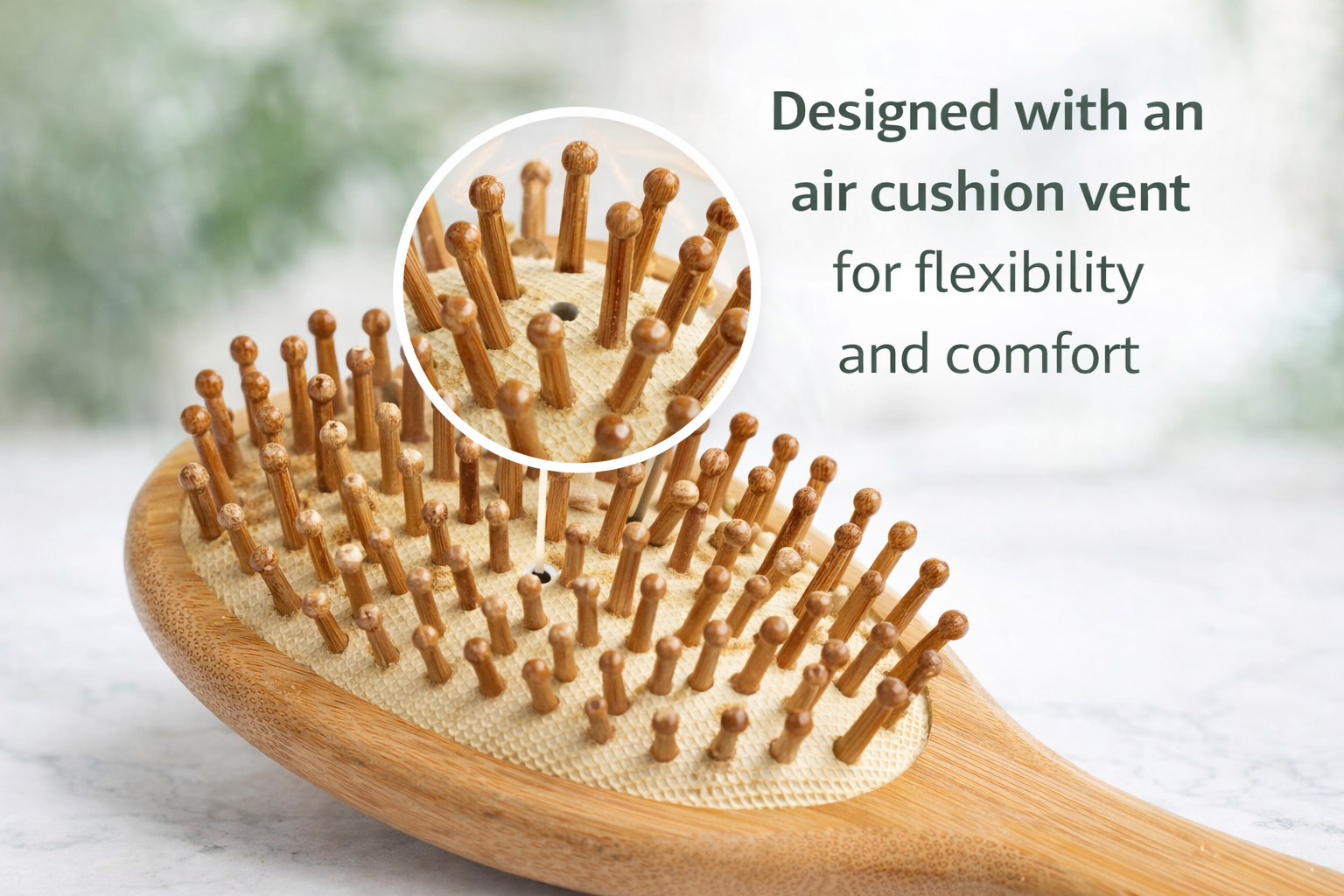 Wooden hairbrush with air cushion vent design on a light background