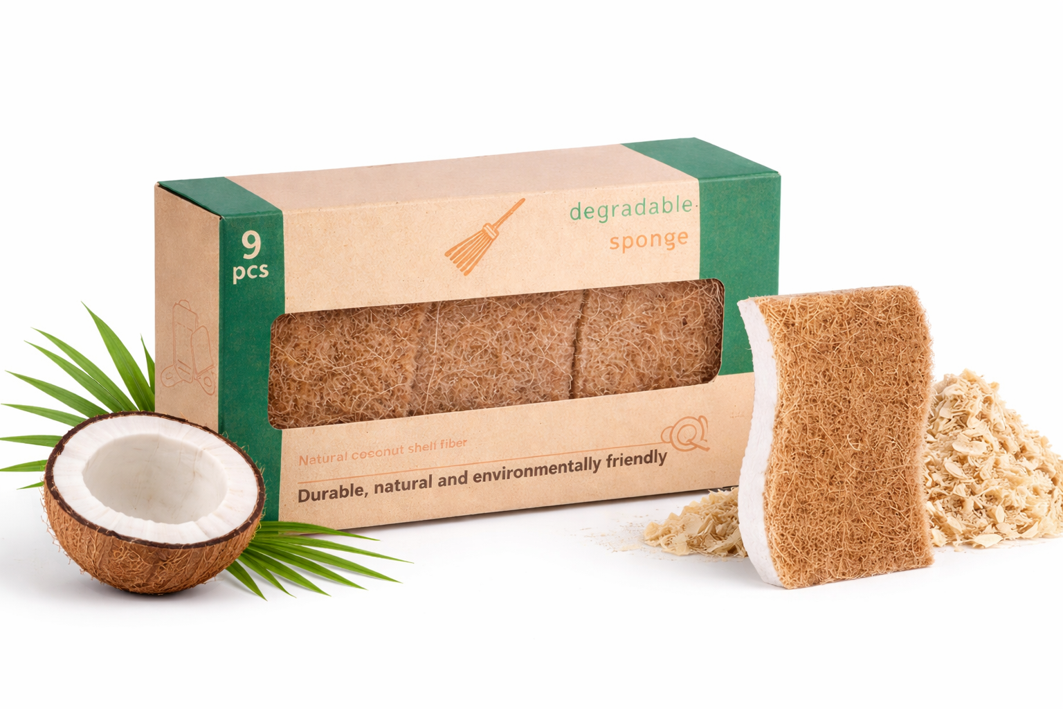 Box of degradable sponges with a coconut and green leaves on a white background