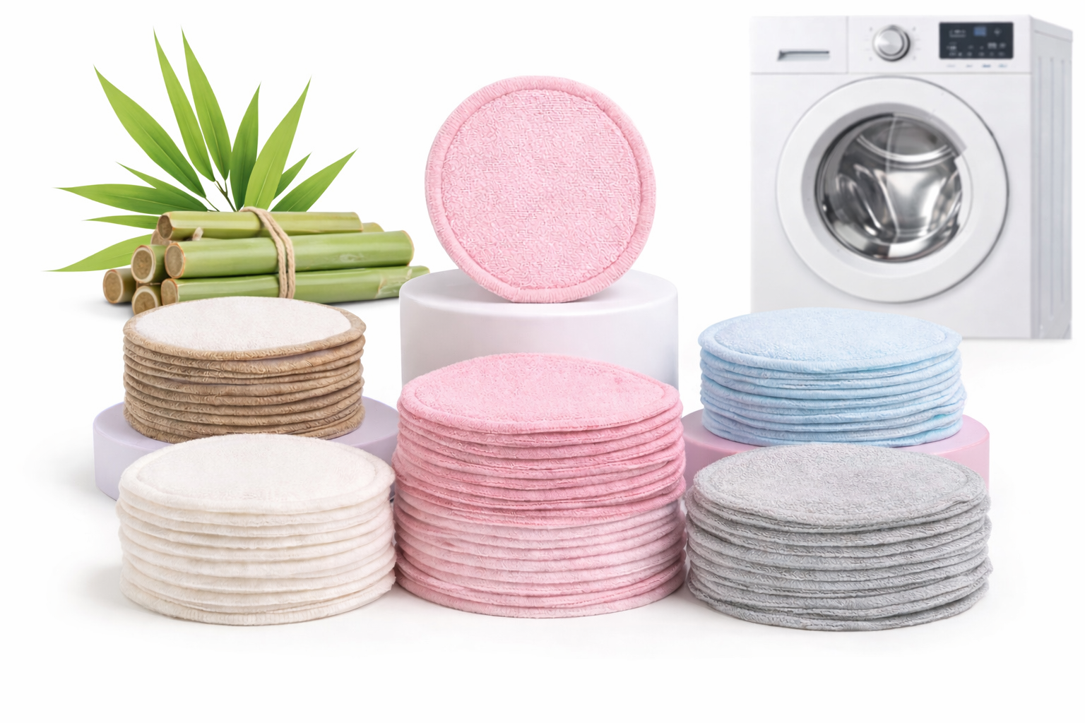 Stacks of reusable cotton pads in various colors with a washing machine and bamboo sticks in the background.