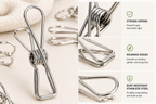 Metal clothespin with features highlighted on a white background
